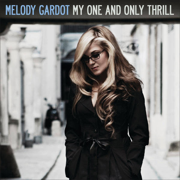 Album cover with Melody Gardot in a black coat and glasses, text 'Melody Gardot My One and Only Thrill' above.