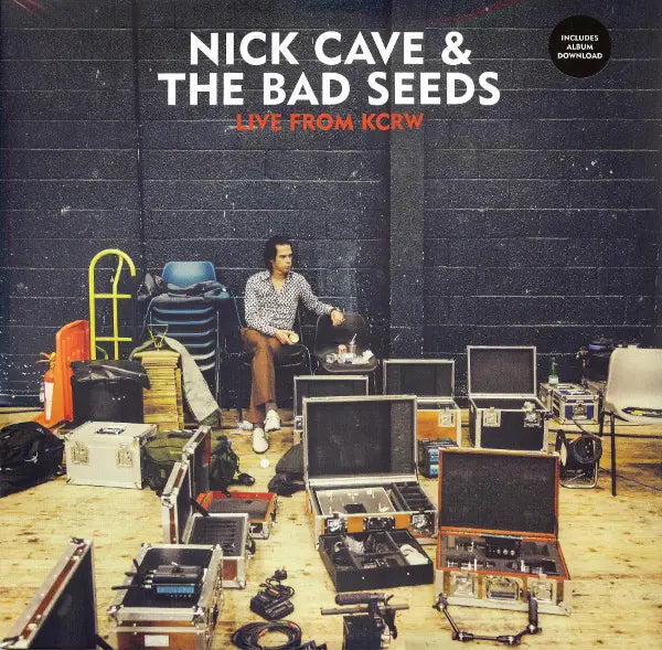 Album cover featuring Nick Cave & The Bad Seeds with equipment with Nick sitting on a chair.