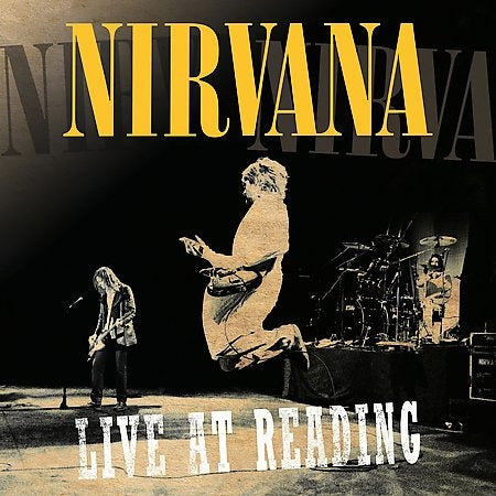Cover art for Nirvana - Live At Reading 2x Vinyl LP featuring a black and white photo of the band members performing at a concert with the band's name and the album title text in yellow.