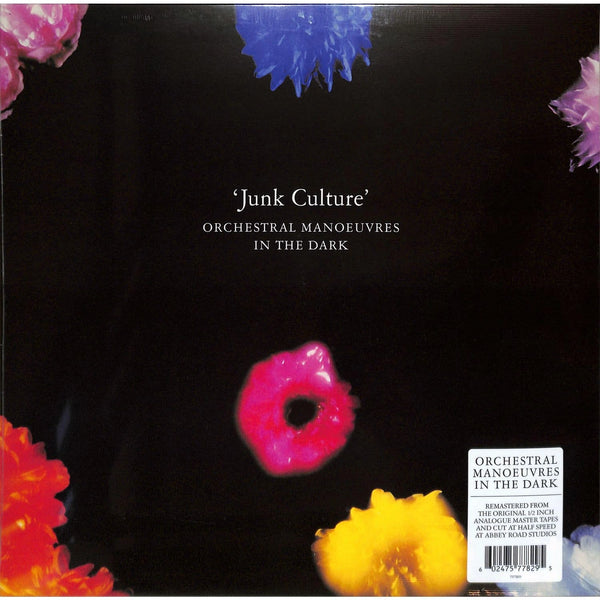 Album cover for 'Junk Culture' by Orchestral Manoeuvres in the Dark with colorful flowers on a black background.