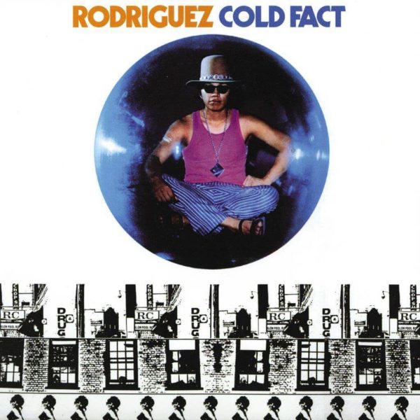 The cover of Rodriguez's 'Cold Fact' album features a portrait of the artist sitting against a blue background, with a cityscape illustration below. The album title is displayed at the top.