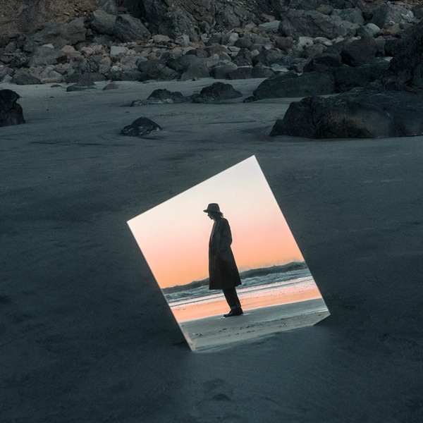 A vinyl LP record titled 'Beth Orton - Weather Alive' with a silhouette of Beth on the cover reflrcting in a mirror, set against a beach and cliffs background.