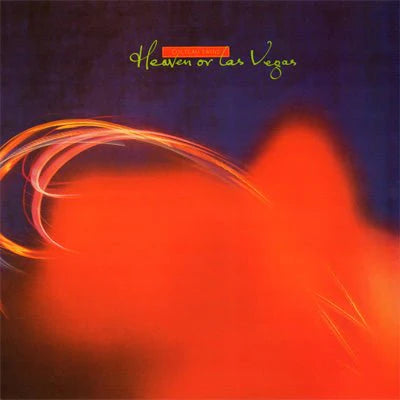 Album cover with abstract design and text 'Heaven or Las Vegas' on a dark background