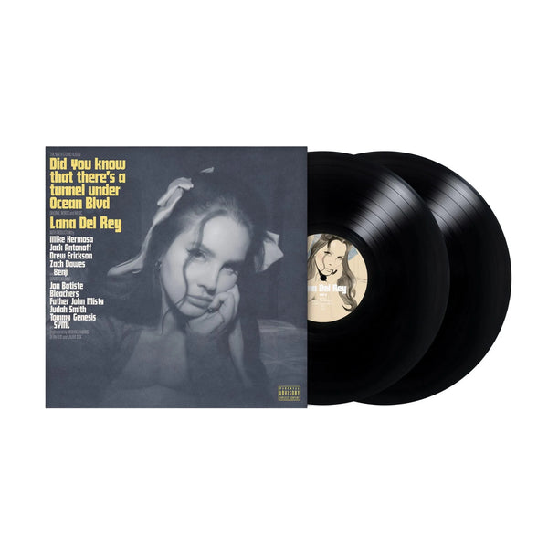 Two vinyl LP records with the artwork 'Did You Know There's A Tunnel Under Ocean Blvd' by Lana Del Rey, featuring a black and white photo of the artist.