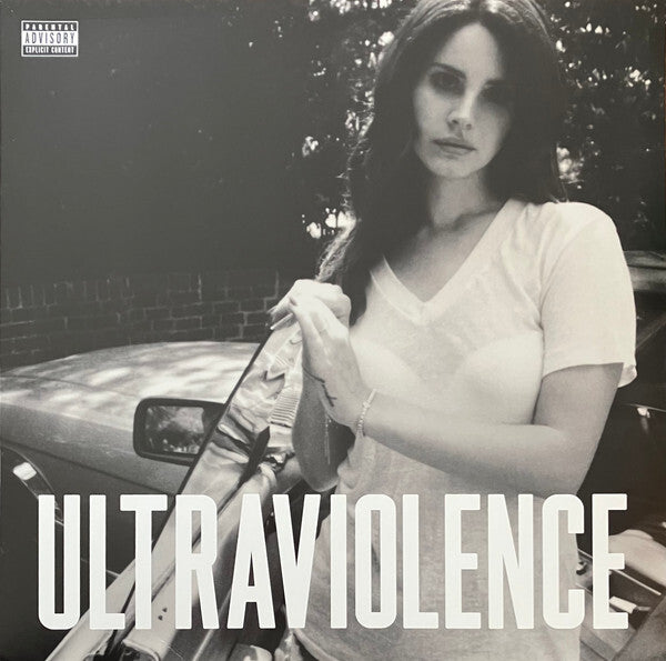 The image features the cover of the album "Ultraviolence" by Lana Del Rey. The cover art is in black, white, and shades of gray, depicting a moody, monochromatic scene.