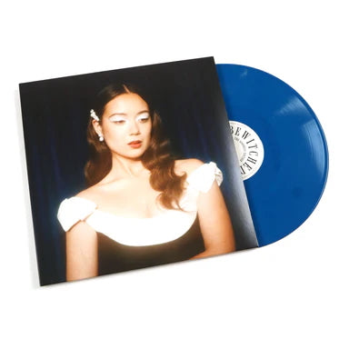 cover art for Bewitched Goddess Edition dark blue 45RPM vinyl by Laufey