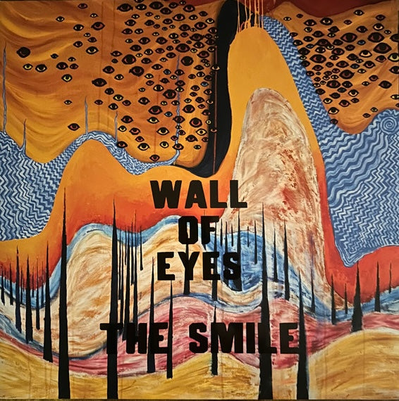 A vinyl LP cover featuring a abstract and colorful artwork with the text 'WALL OF EYES THE SMILE'.