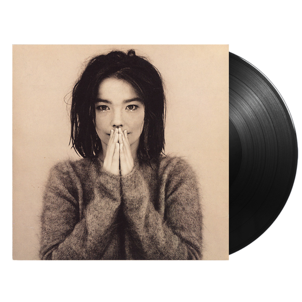 Debut vinyl LP reissue by Björk, collectible electronic-pop vinyl. Sepia tone portrait of Björk with her hands in front of her mouth