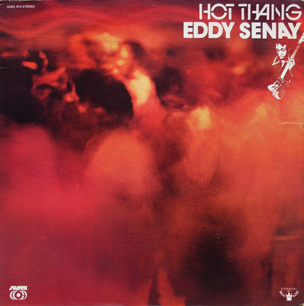 This image features the album cover for "Eddy Senay - Hot Thang, Vinyl LP." The artwork is enigmatic and abstract, utilizing a crimson hue with what appears to be indistinct, ghostly figures and shapes.