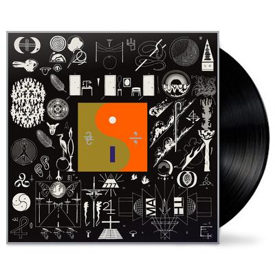 Vinyl LP of Bon Iver's album '22, A Million' featuring a black record with a ying and yang symbol, and a cover filled with monochrome illustrations and text.