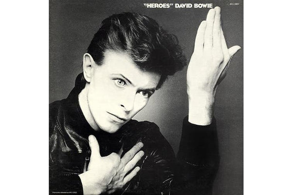 David Bowie album cover for 'Heroes' showing a black and white image of Bowie with a grey tint, 45th anniversary edition.
