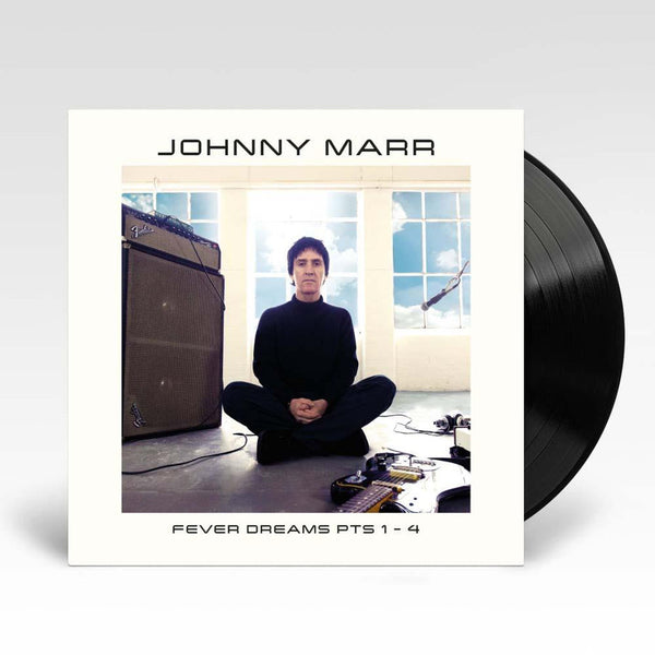 Johnny Marr's album 'Fever Dreams Pts 1-4' on vinyl LP with a white label featuring a photo of Johnny Marr sitting on the floor by his guitar