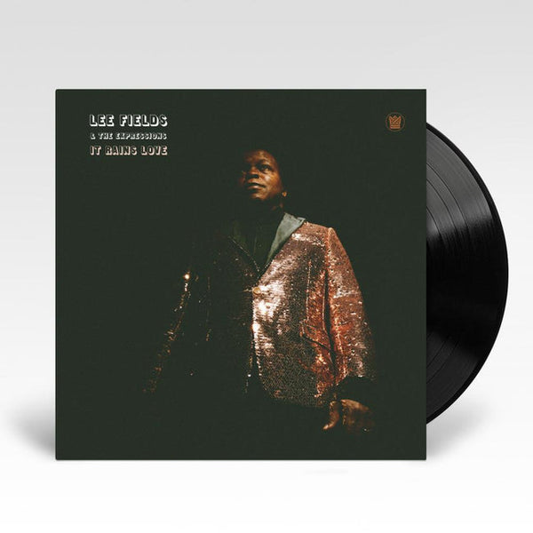 Lee Fields & The Expressions It Rains Love vinyl LP cover with Lee Fields wearing a gold jacket on the front