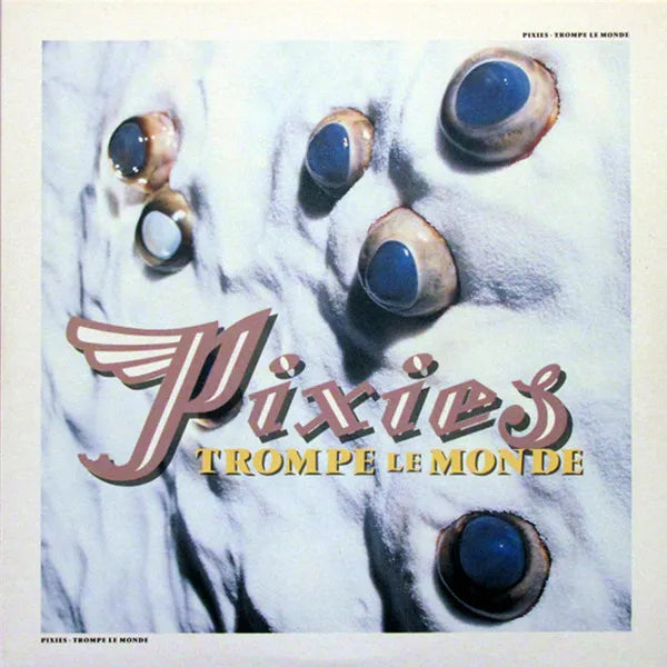 Pixies Trompe Le Monde green vinyl LP, alternative rock, surreal artwork, collectible vinyl.