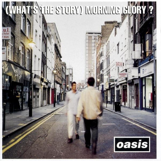 The album cover of Oasis - (What's the Story) Morning Glory? featuring two men walking down a street in front of a record store.