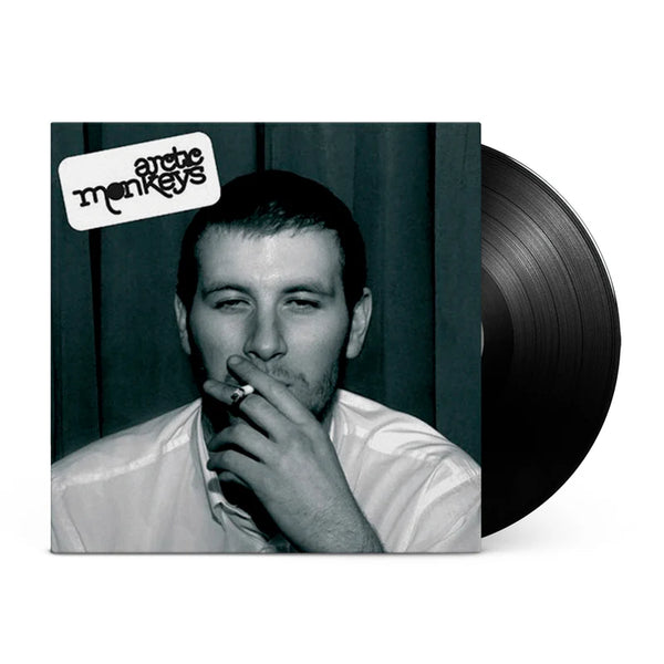 Vinyl record with a black and white photo of a man smoking and the Arctic Monkeys logo.