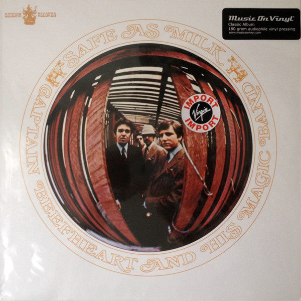 Captain Beefheart And His Magic Band - Safe As Milk album cover featuring a photograph of the band members using a fisheye lens