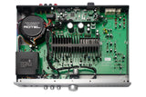 Close-up of a Rotel audio amplifier with visible circuitry and branding.
