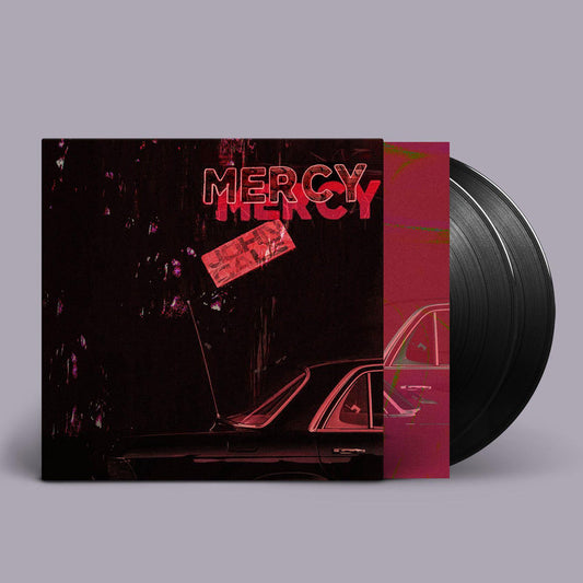 John Cale - Mercy album vinyl LP with a dark cover featuring the title 'MERCY' in red text over a abstract image of a car 
