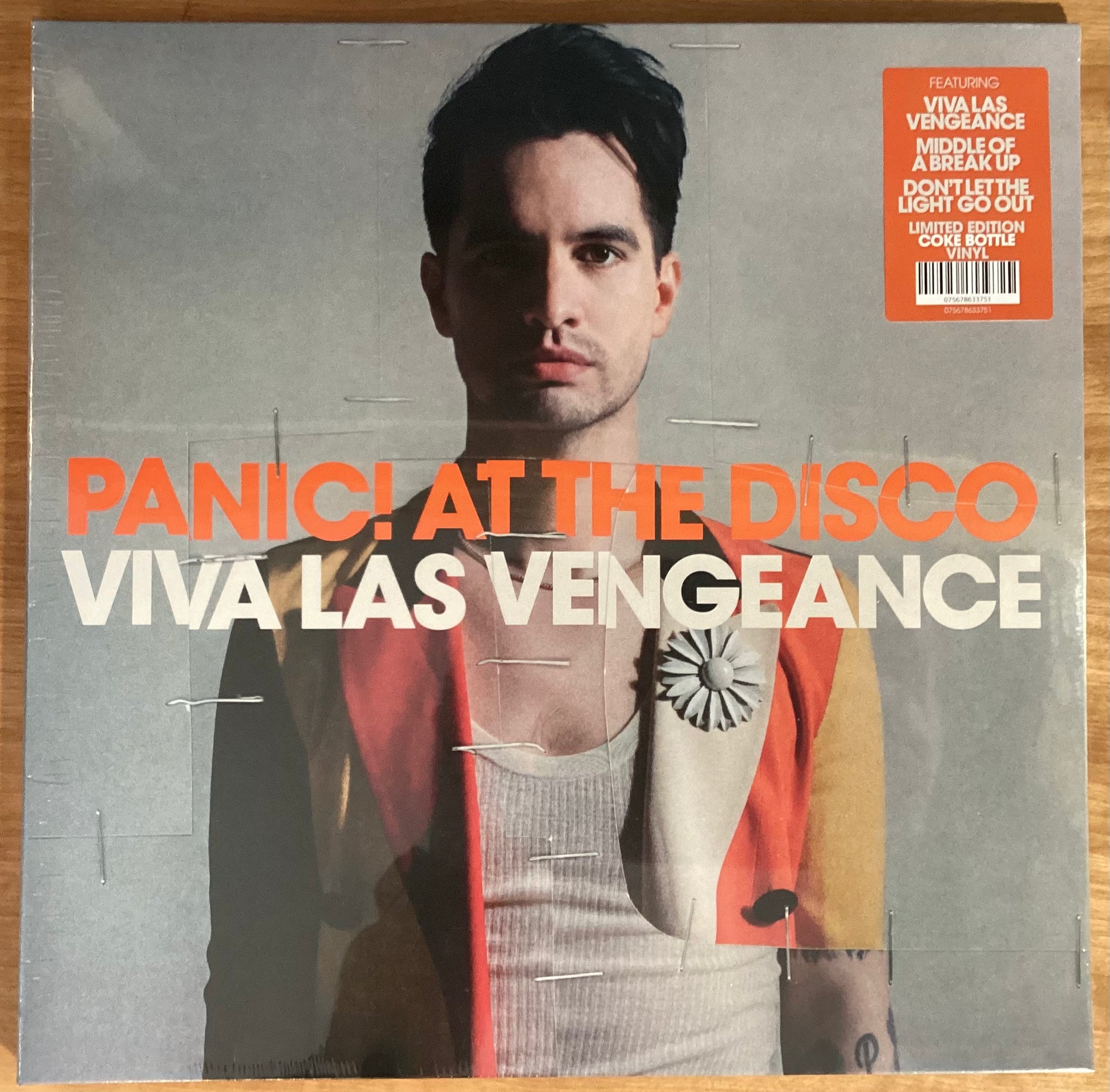 Limited edition vinyl LP of Panic! At The Disco - Viva Las Vengeance with a coke bottle colored label.