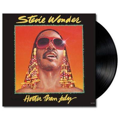 Stevie Wonder album cover for 'Hotter Than July' on vinyl LP showing the artist with sunglasses and a colorful backdrop.