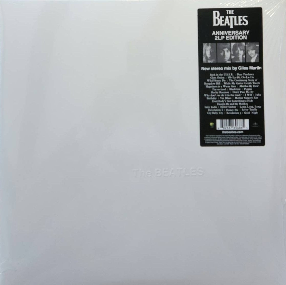 This image displays the back cover of a vinyl 2LP edition of "The Beatles - White Album (2018 Giles Martin Mixes, 180g)." The cover is white with a simple sticker design featuring the band's name in a classic font.