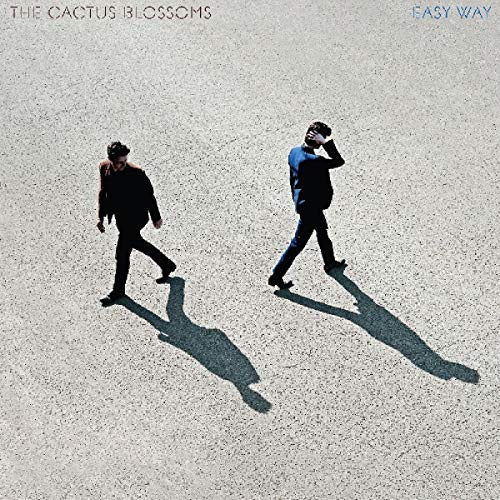 The image features a vinyl LP record of "The Cactus Blossoms - Easy Way." The album artwork shows two silhouetted figures, one on the left and one on the right walking away from each other