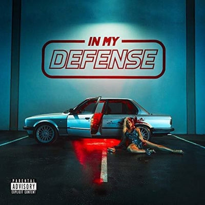 Coloured vinyl LP album cover for Iggy Azalea's 'In My Defense'. The cover featuresAzalea sitting next to a blue car, with the album title above in a spotlight