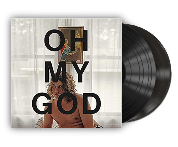A vinyl LP record with the text 'OH MY GOD' on the cover, featuring an artwork with Kevins face partially covered by the text.