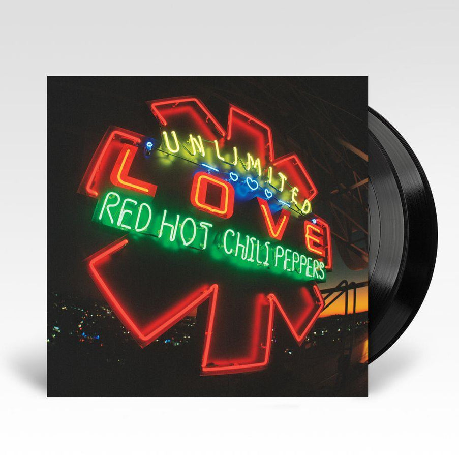A vinyl LP of Red Hot Chili Peppers' album 'Unlimited Love' with a neon sign cover art.